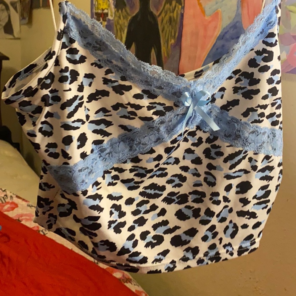 blue and white cow print top